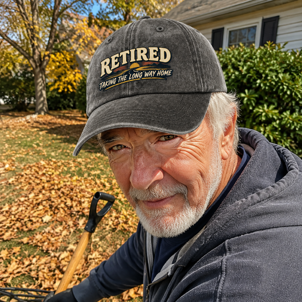 Gray vintage washed cap with printed Taking The Long Way Home slogan, senior man outdoors