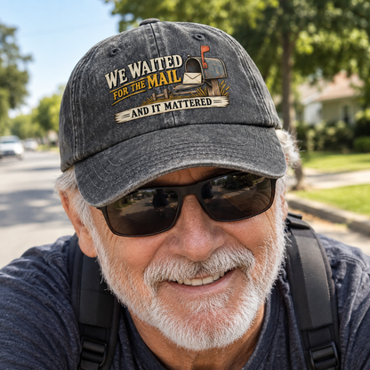 Senior wearing vintage washed cap with We Waited For The Mail And It Mattered printed design