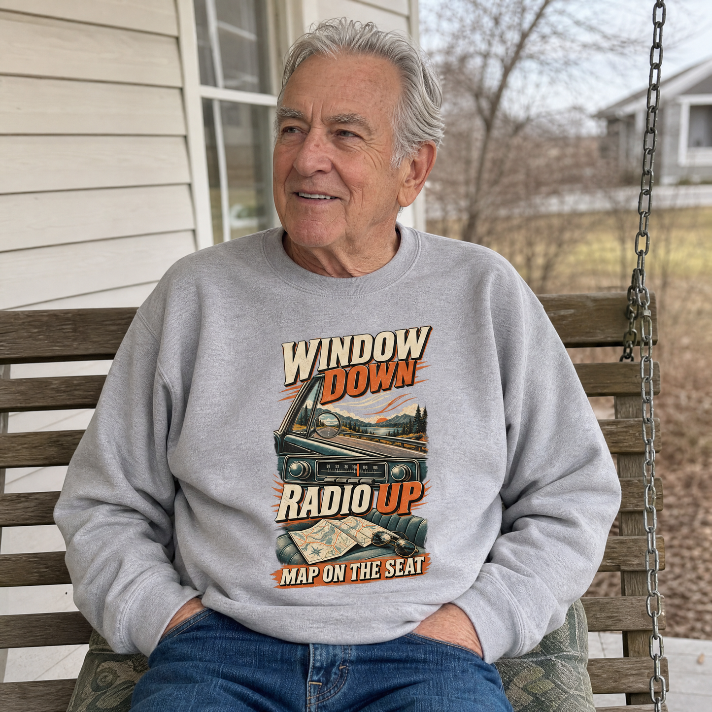 Senior man wearing gray vintage sweatshirt with printed Window Down Radio Up design outdoors