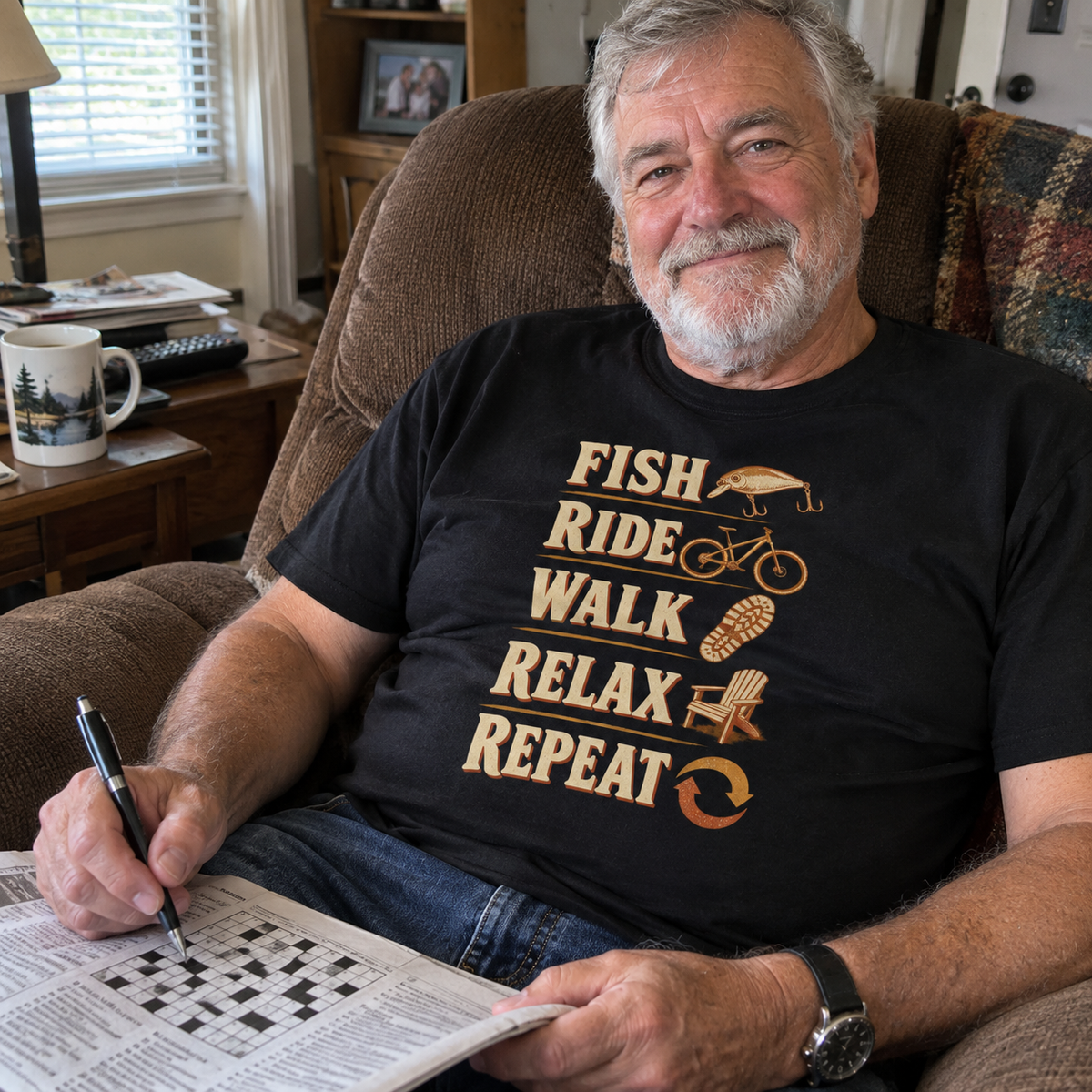 Senior man in vintage t-shirt with printed Fish Ride Walk Relax Repeat slogan, seated indoors.