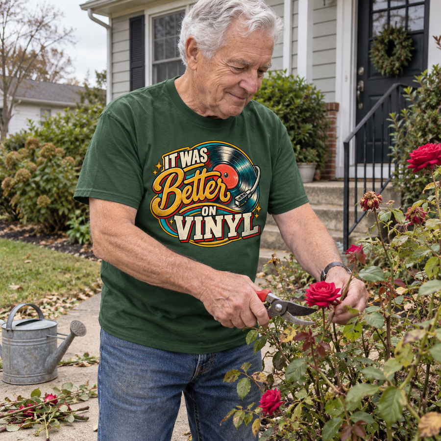 Senior man pruning roses in green vintage t-shirt printed It Was Better On Vinyl