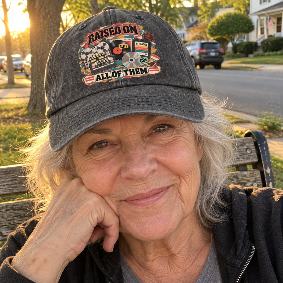 Senior woman wearing gray vintage washed cap printed with Raised On All Of Them