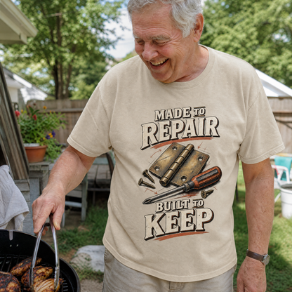 Cream vintage t-shirt with printed Made To Repair Built To Keep slogan, senior man outdoors