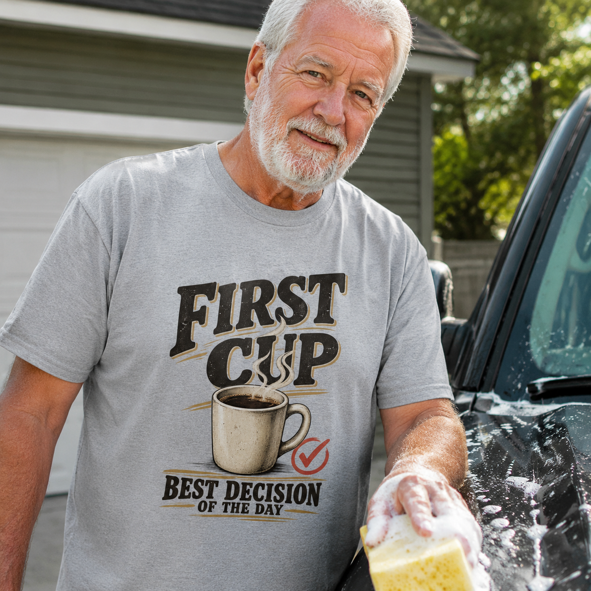 Gray vintage t-shirt with printed First Cup slogan worn by senior man outdoors