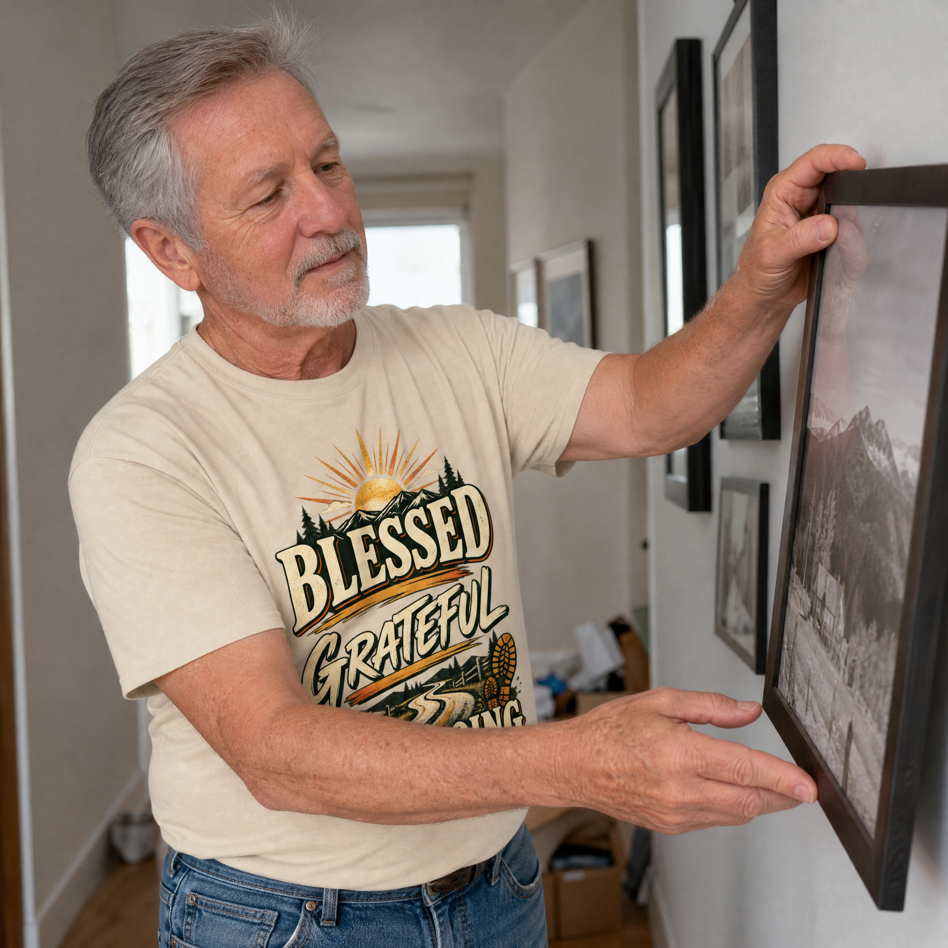 Senior man wearing beige vintage t-shirt with Blessed Grateful Still Going print indoors