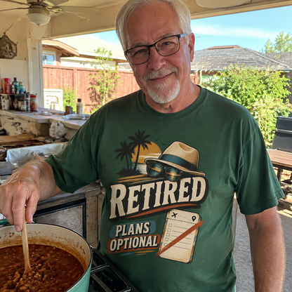 Senior man wearing green vintage t-shirt with printed Retired Plans Optional design outdoors