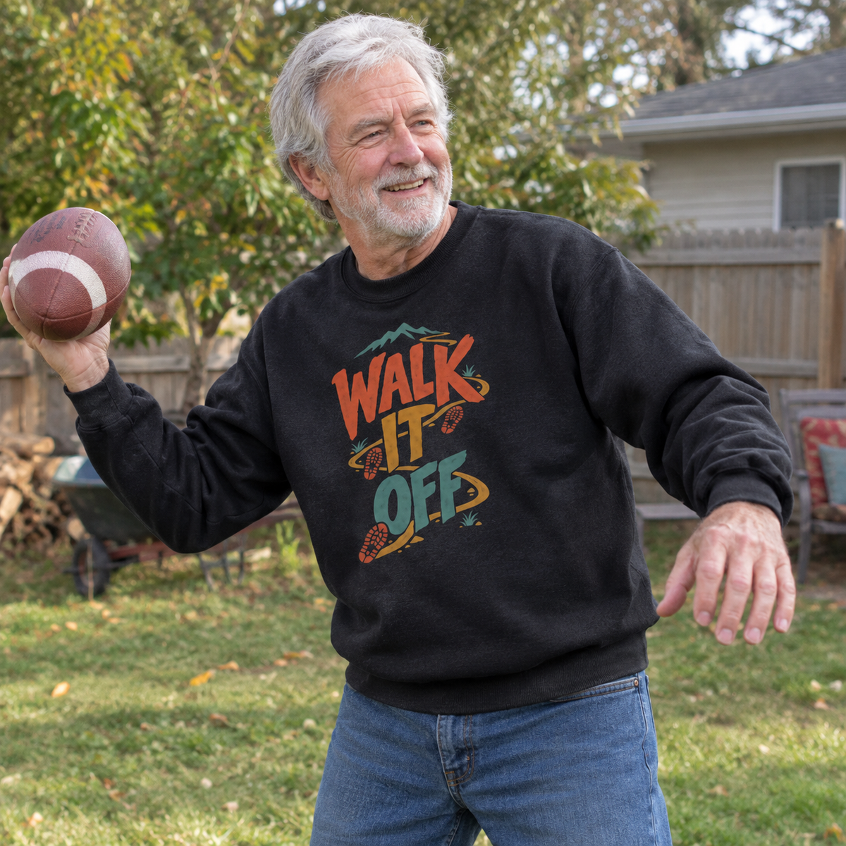 Senior man wearing black vintage sweatshirt with printed Walk It Off design outdoors