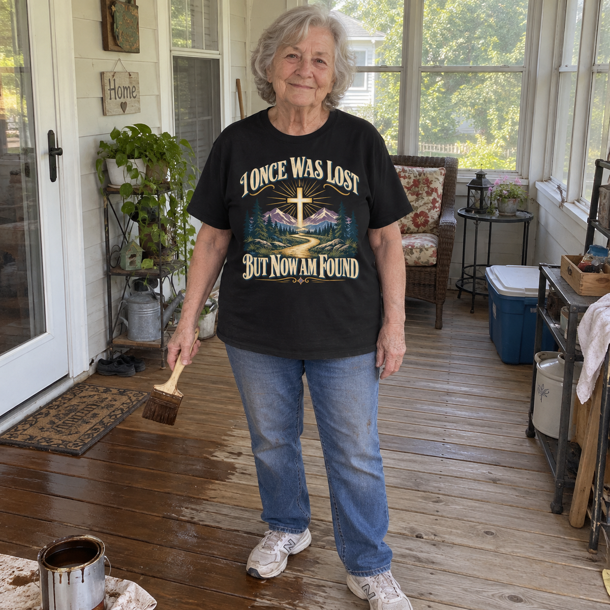 Senior woman wearing black vintage t-shirt printed I Once Was Lost But Now Am Found