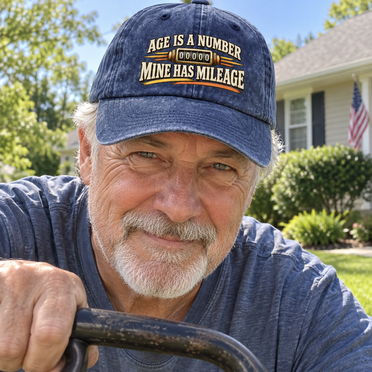 Senior man wearing navy vintage washed cap printed Age Is A Number Mine Has Mileage