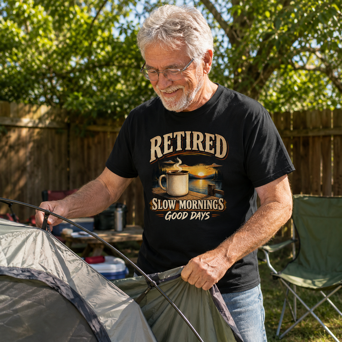 Senior man wearing black vintage t-shirt with printed Retired Slow Mornings Good Days outdoors