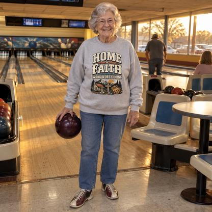 Senior woman wears gray vintage sweatshirt printed Home Faith Work Worth Doing at bowling alley.
