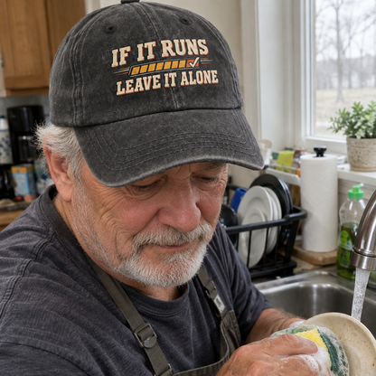 Senior man wearing black vintage washed cap with printed If It Runs Leave It Alone