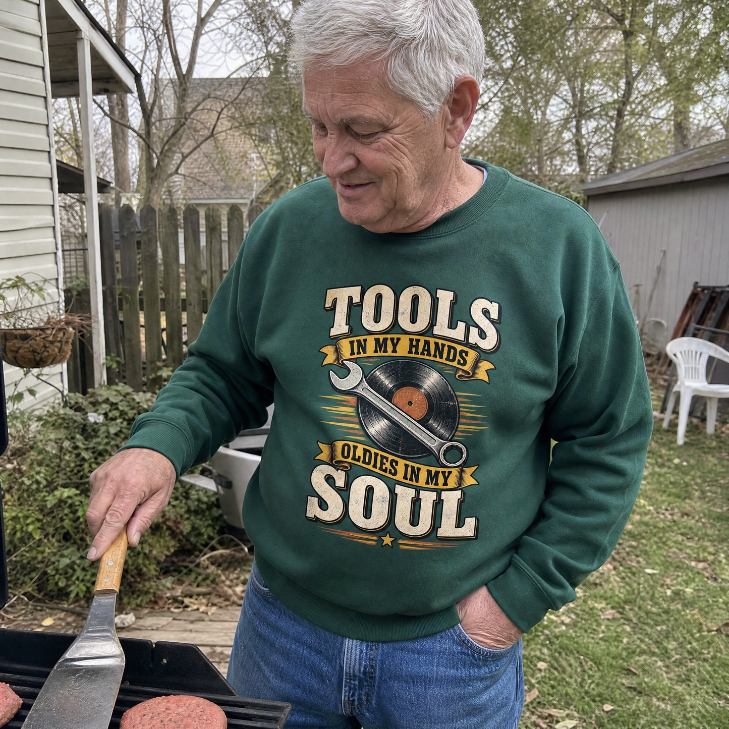 Vintage sweatshirt featuring printed “34 tools in my hands, oldies in my soul” slogan, lifestyle view