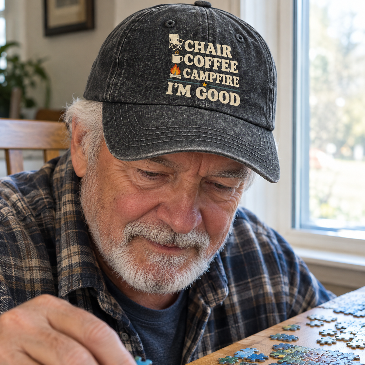 Senior wearing vintage washed cap with Chair Coffee Campfire. I'm Good printed design