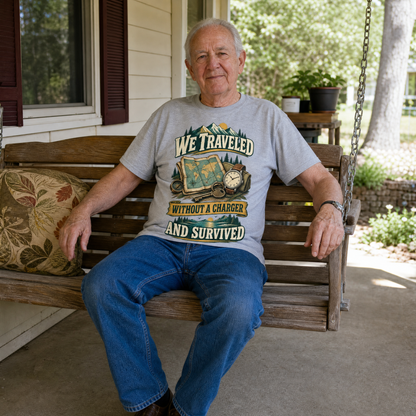 Senior man wearing gray vintage t-shirt with printed travel slogan sitting outdoors on porch
