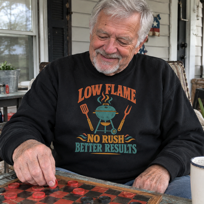 Vintage sweatshirt with Low Flame No Rush Better Results print, worn by senior playing checkers.