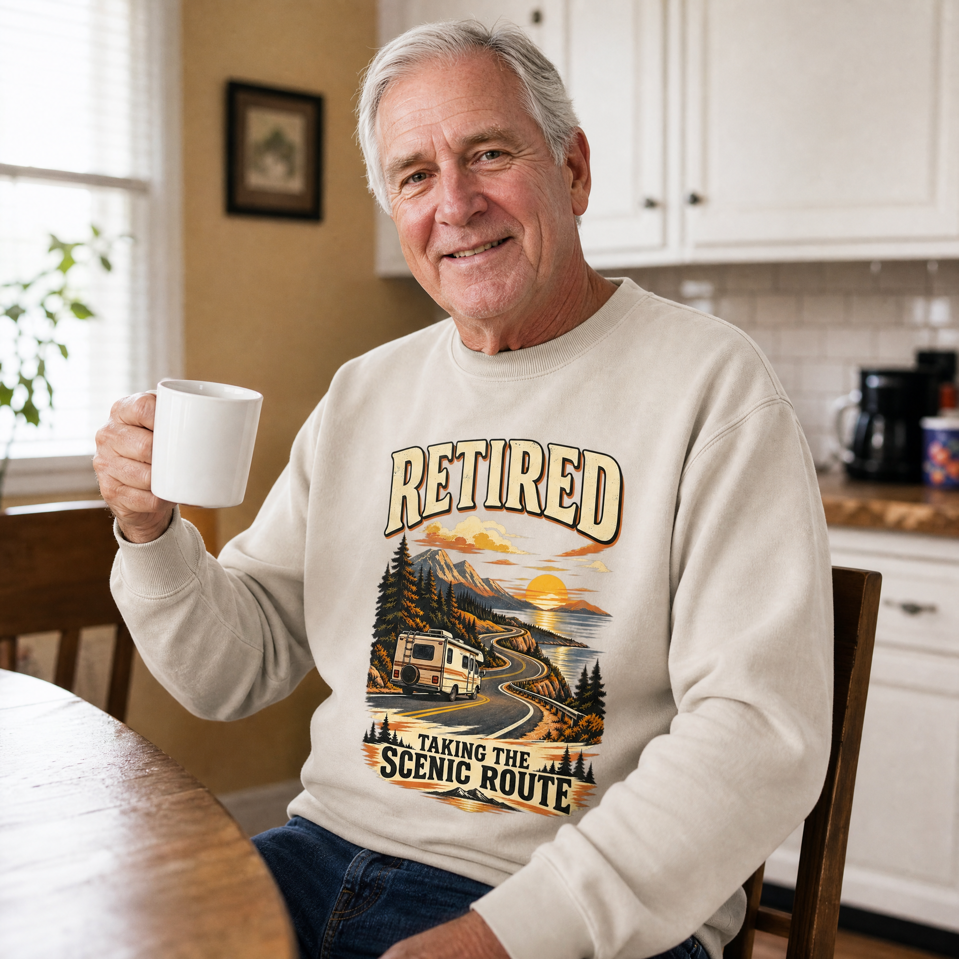 Senior man wearing vintage sweatshirt with printed Retired Taking The Scenic Route design at home