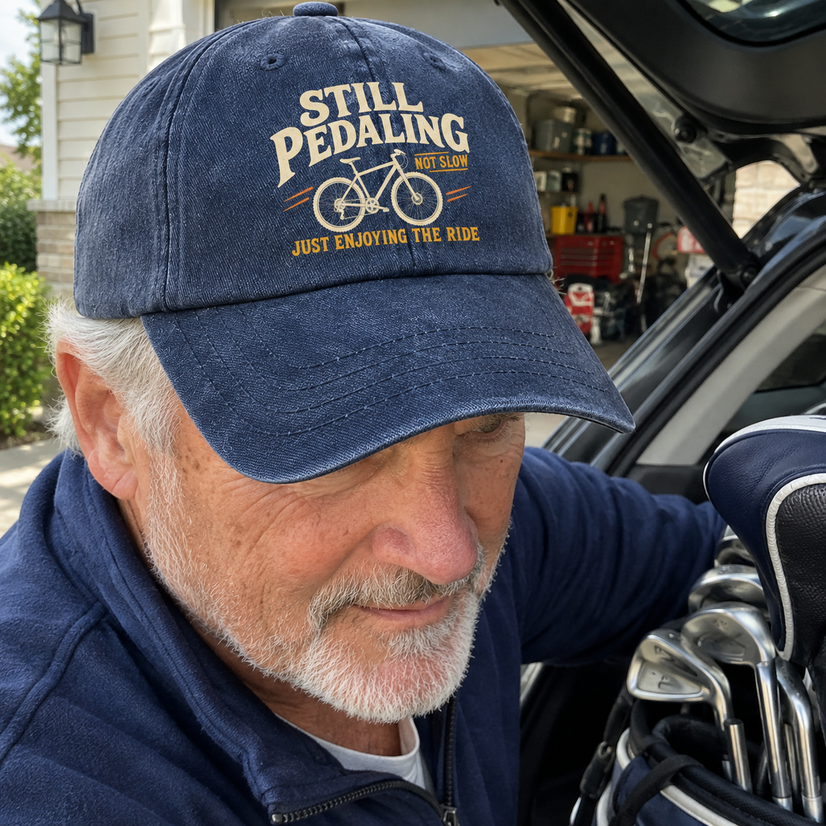 Navy vintage washed cap on senior man, printed bicycle and cycling slogan