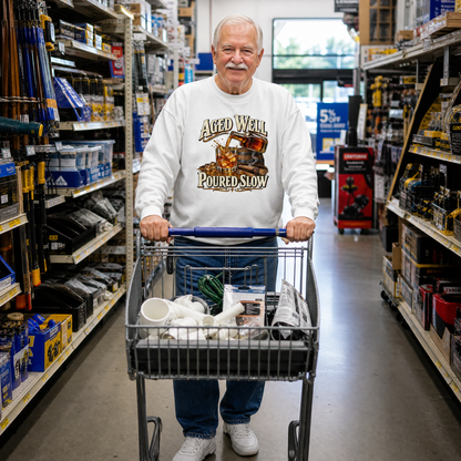 White vintage sweatshirt with Aged Well Poured Slow print, worn by senior man shopping.