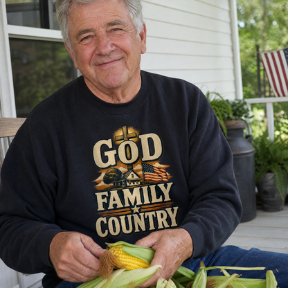 Senior man wearing black vintage sweatshirt with printed God Family Country design outdoors