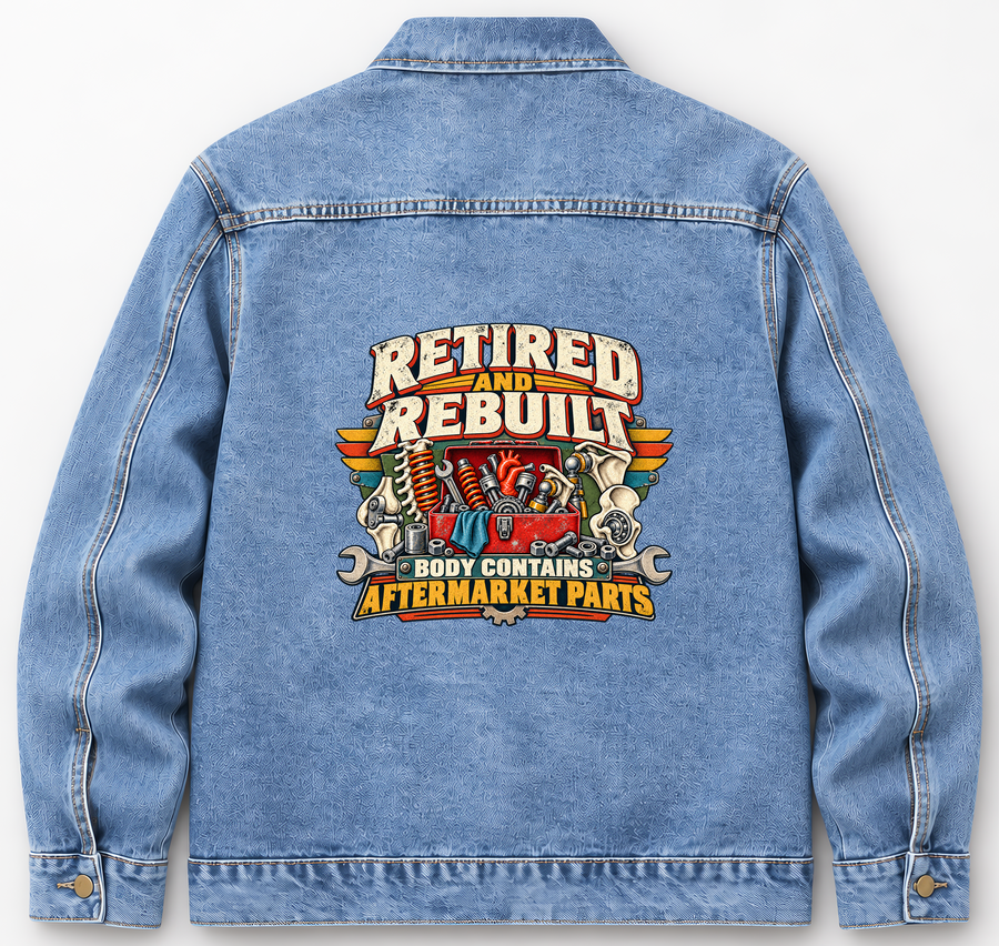 Back of Medium Denim Wash vintage denim jacket with Retired And Rebuilt. Body Contains Aftermarket Parts printed design