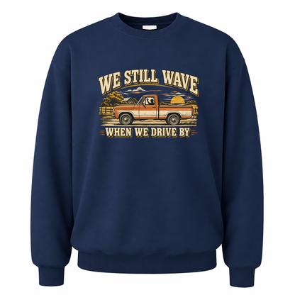 Navy vintage sweatshirt with We Still Wave When We Drive By printed front design