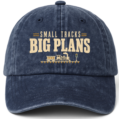 Navy vintage washed cap with Small Tracks Big Plans printed front design