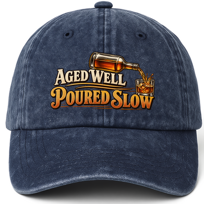 Navy vintage washed cap with Aged Well. Poured Slow printed front design