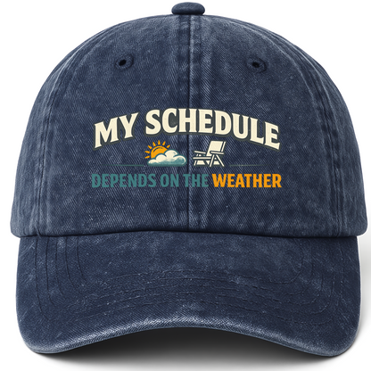 Navy vintage washed cap with My Schedule Depends On The Weather printed front design