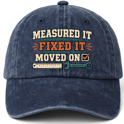 Navy vintage washed cap with Measured It Fixed It Moved On printed front design