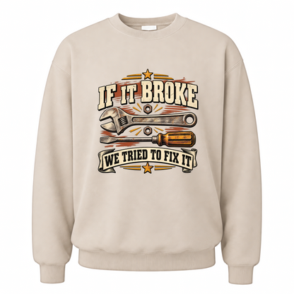 Sand vintage sweatshirt with If It Broke We Tried To Fix It printed front design