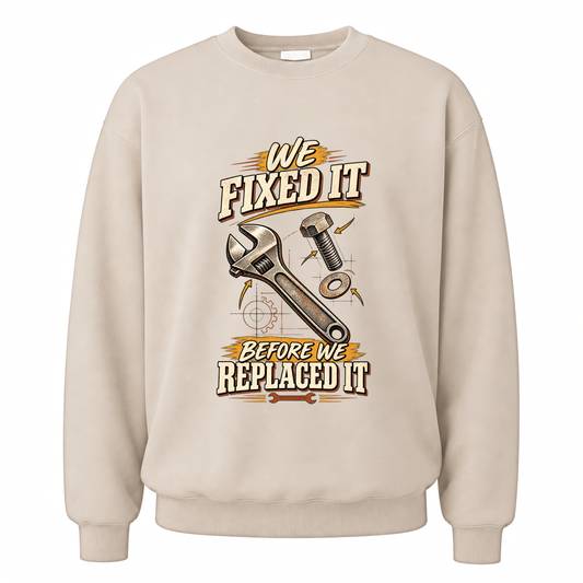 Sand vintage sweatshirt with We Fixed It Before We Replaced It printed front design
