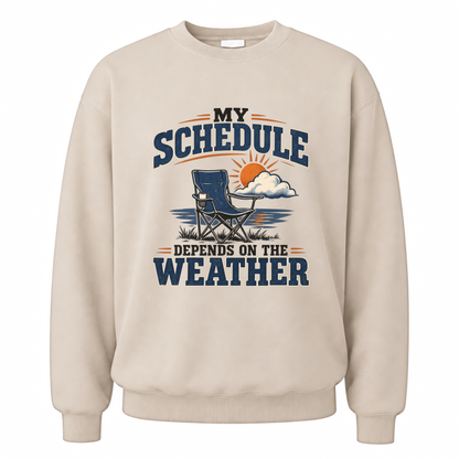 Sand vintage sweatshirt with My Schedule Depends On The Weather printed front design