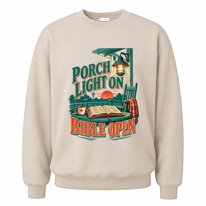 Sand vintage sweatshirt with Porch Light On Bible Open printed front design