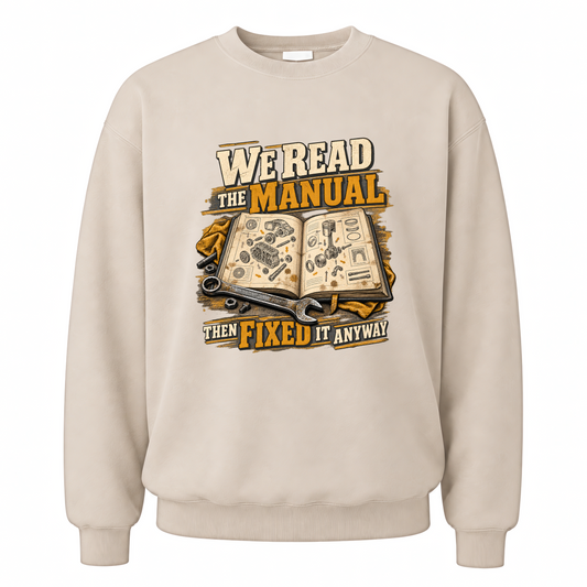 Sand vintage sweatshirt with We Read The Manual Then Fixed It Anyway printed front design
