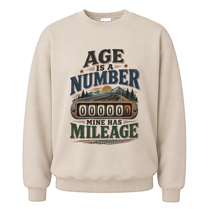 Sand vintage sweatshirt with Age Is A Number Mine Has Mileage printed front design