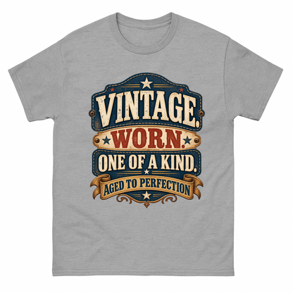 Gray T-shirt with vintage worn one of a kind badge design
