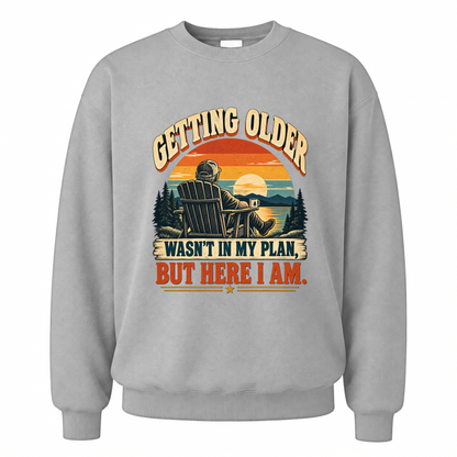 Sport Grey vintage sweatshirt with Getting Older Wasn't In My Plan, But Here I Am. printed front design