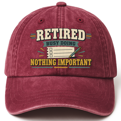 Wine Red vintage washed cap with Retired. Busy Doing Nothing Important printed front design
