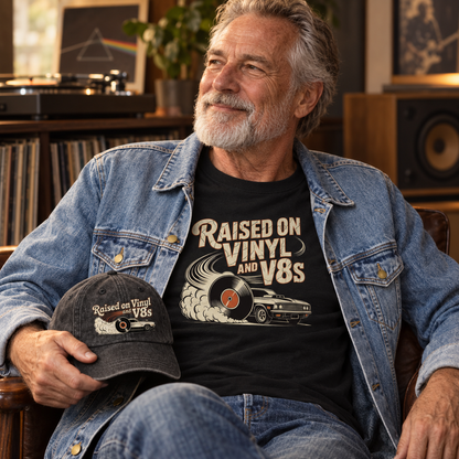 Senior man by a turntable in Raised on Vinyl and V8s denim jacket and t-shirt with the matching cap